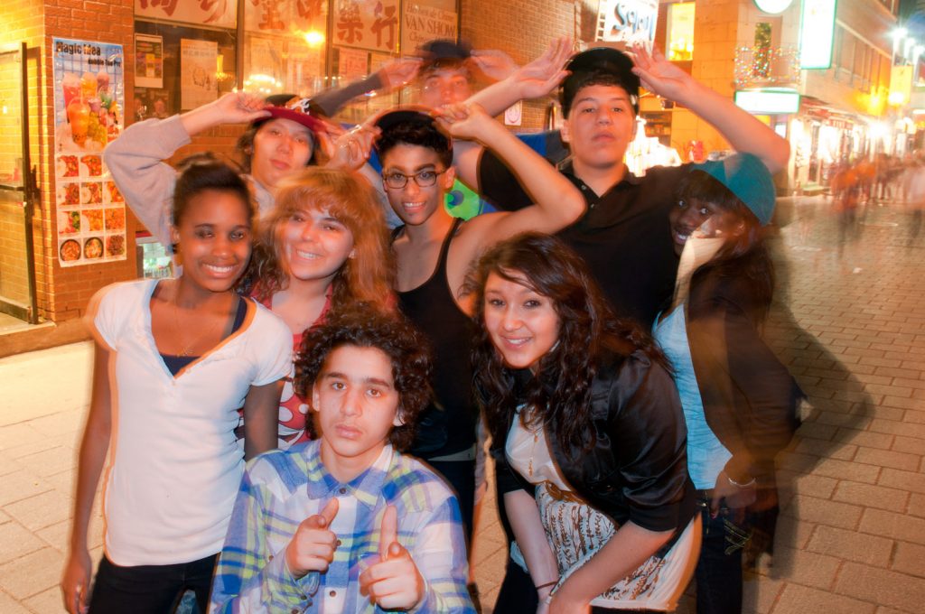 Young people in Chinatown, another slow sync