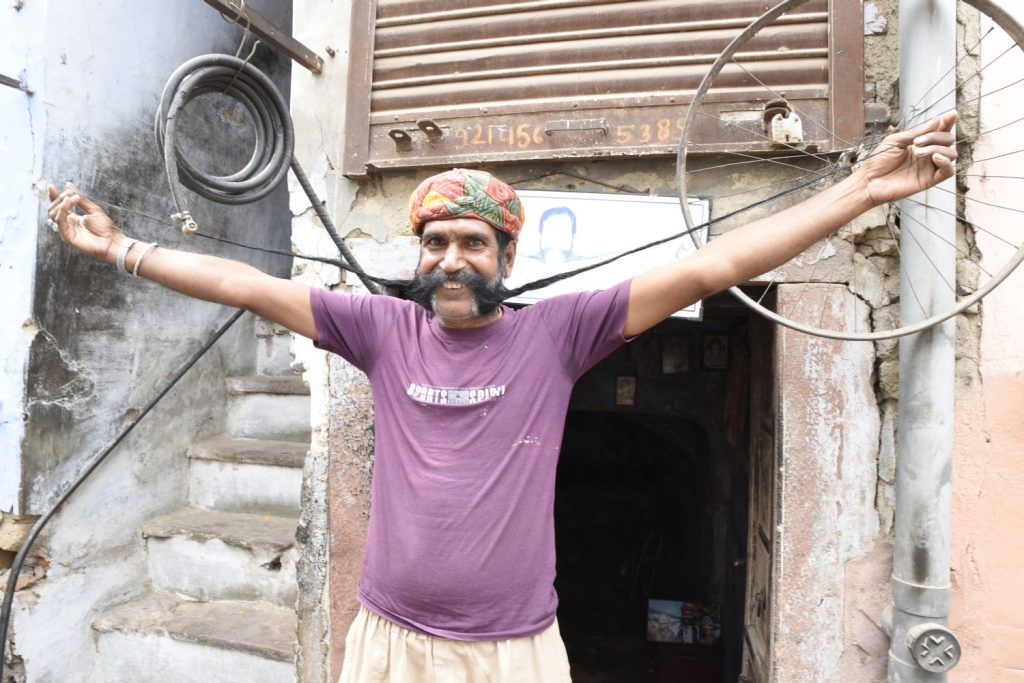 I met this man in the old town in Bikaner and learned he won a moustache growing contest. After I took a photo of him with his moustache folded up, he showed me what it looked like when it's extended. (Richard McGuire photo)