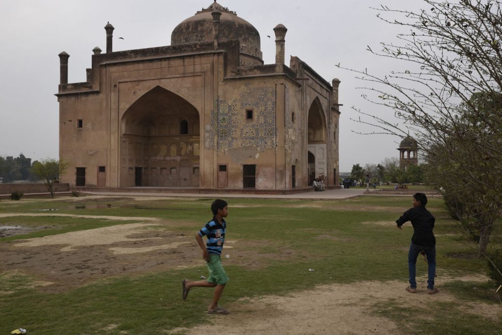 Boys play cricket in the shadow of the Chini-ka-Rauza, built as a tomb for Afzal Khan, a Persian poet from Shiraz, Iran. (Richard McGuire photo)