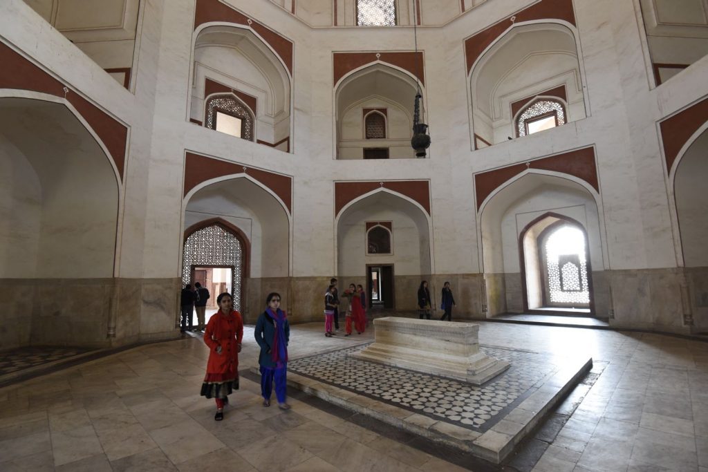 Visitors walk around Homayun's tomb which is in a high-vaulted chamber. Other family and officials are also buried at the building. (Richard McGuire photo)