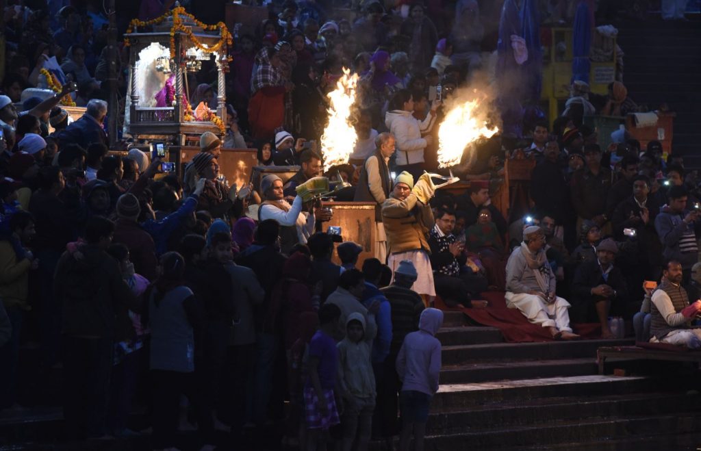 From sunset until dark on the ghats at Har-ki-Pairi in Haridwar, a Hindu religious ceremony takes place every evening. It culminates with priests carrying flaming torches. (Richard McGuire photo)
