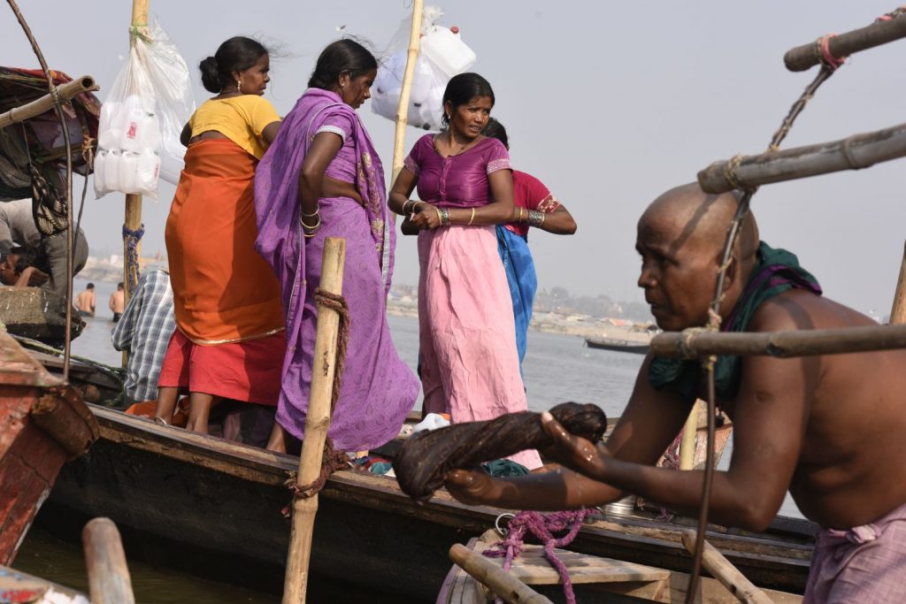 Devout Hindus bathe at Sangam, the confluence of the holy Ganges and Yamuna rivers at Allahabad. Numbers are far fewer than the 32 million people who bathed there on one day during Kumbh Mela in 2013. (Richard McGuire photo)