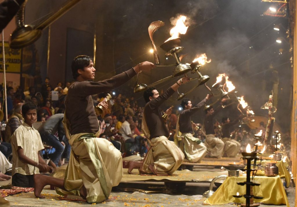 Fire is an important part of the evening rituals performed by Hindu priests on the ghats beside the Ganges River in Varanasi. (Richard McGuire photo)