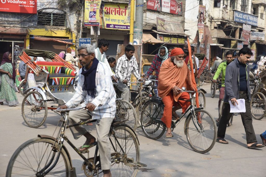 Bicycles and pedal rickshaws intersect at a busy intersection near the ghats in Varanasi. Although most motorized vehicles can't enter this part during the daytime, motorcycles, unfortunately, can go anywhere they like. (Richard McGuire photo)
