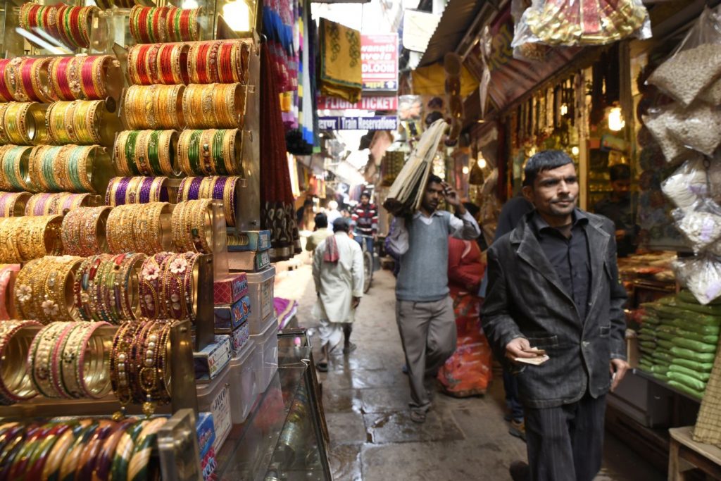 The streets in the old city of Varanasi are so narrow that two people barely have room to pass. That doesn't stop the omnipresent infernal motorcycles from speeding down them, blowing their horns so that pedestrians can jump to the side. (Richard McGuire photo)