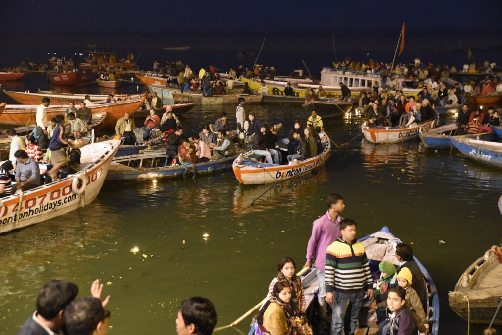 People watch the evening cereomony from boats on the Ganges River in Varanasi. (Richard McGuire photo)