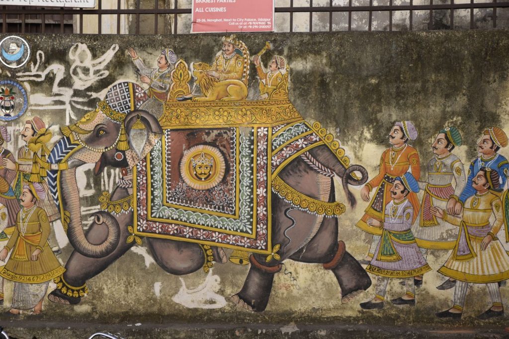 Many of the walls on streets of Udaipur feature paintings done in the traditional styles of Rajasthan. (Richard McGuire photo)