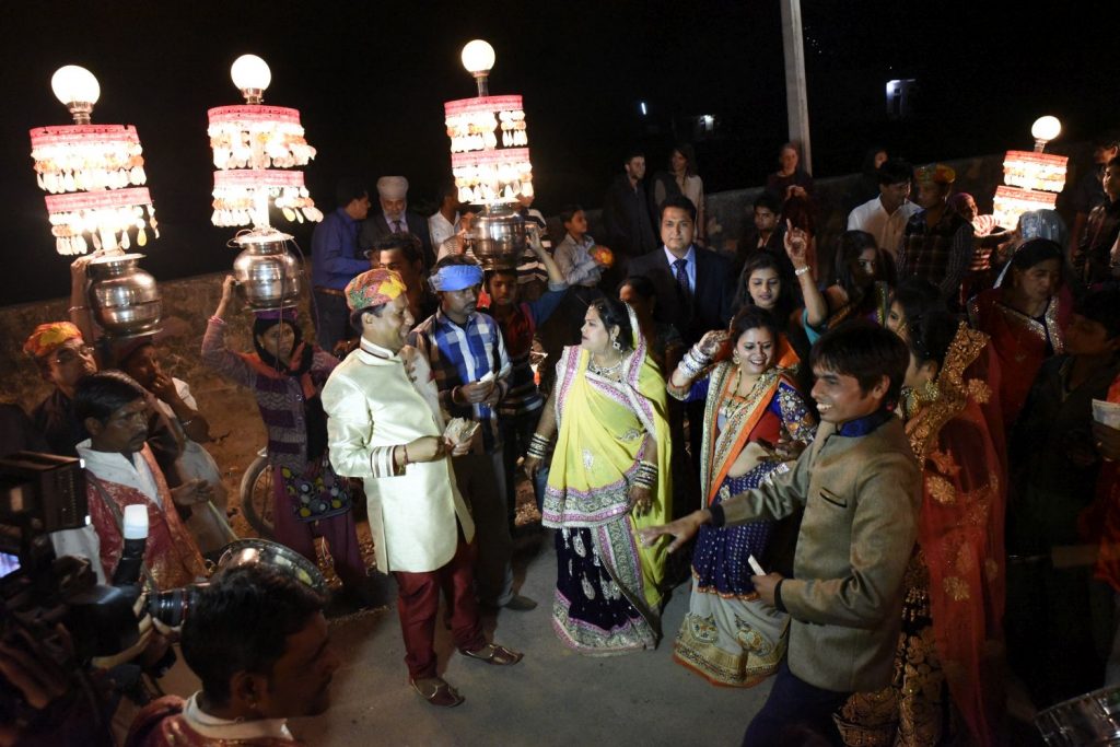 A wedding party passed by on the street in front of my hotel in Pushkar, complete with marching band and people carrying bright electric lamps. (Richard McGuire photo)