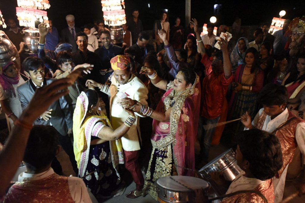 A wedding party passed by on the street in front of my hotel in Pushkar, complete with marching band and people carrying bright electric lamps. (Richard McGuire photo)