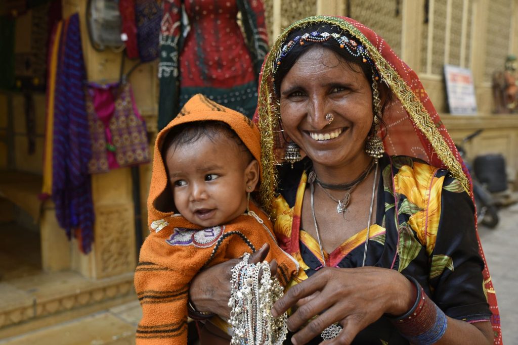 This woman asked to pose for a photo with her child for a few rupees. At first I refused her, but she persisted and I actually got a good smile from her. Many Rajasthani women dress very colourfully, but are shy about being photographed. (Richard McGuire photo)