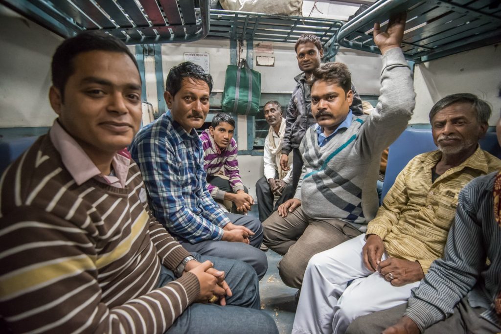 These were my fellow passengers on the train from Sanchi to Bhopal, that ran late. The man on the left spoke good English and he translated for the others, as I attempted also to communicate in my feeble Hindi. They had a lot of questions for me as it's not usual for them to have a conversation with a foreigner. (© Richard McGuire photo)