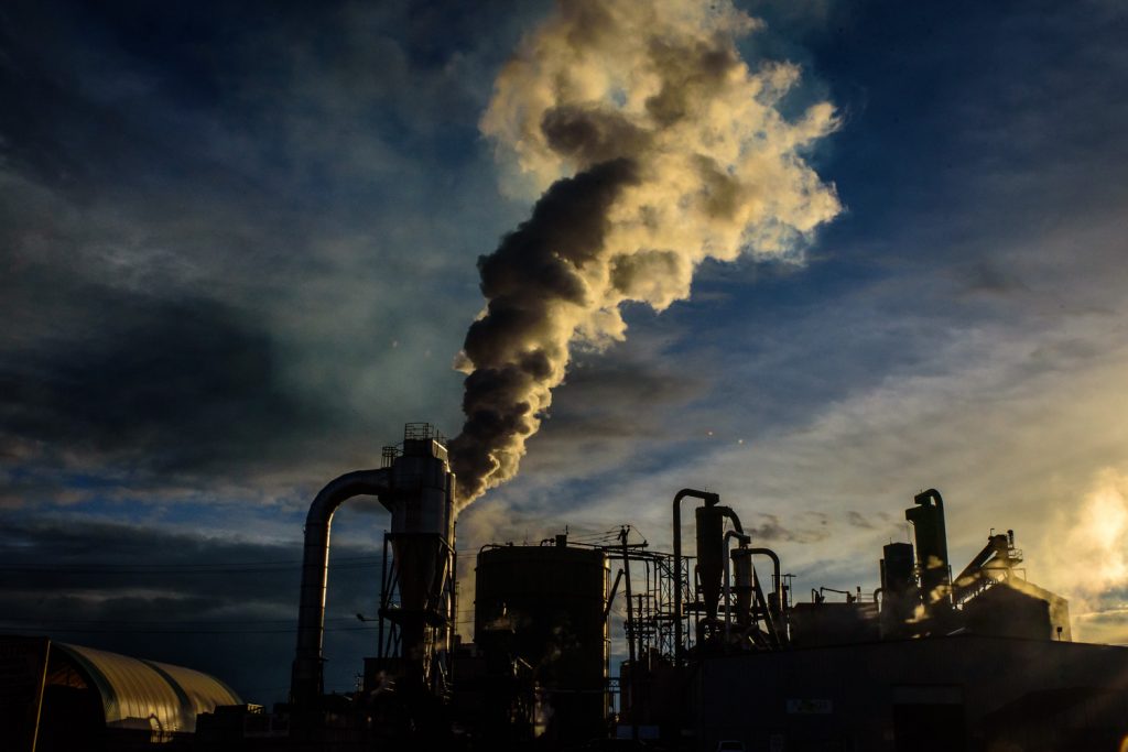 A plume of emissions catches the light of the setting sun at one of the forest product plants just west of Vanderhoof, B.C. (Richard McGuire photo)