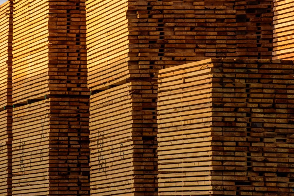 Stacks of lumber catch the glow of the setting sun at one of the forest product plants just west of Vanderhoof, B.C. (Richard McGuire photo)