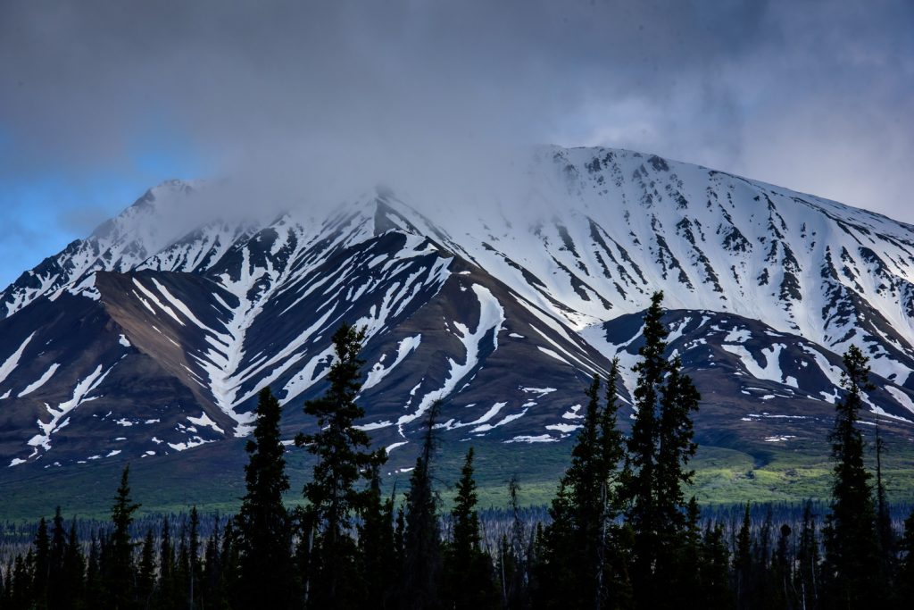 It was a rainy day when I drove to Haines Junction. That evening I went for a drive up to Destruction Bay on Kluane Lake, skirting Kluane National Park. The sun gradually emerged from the clouds, creating some dramatic weather. (Richard McGuire photo)