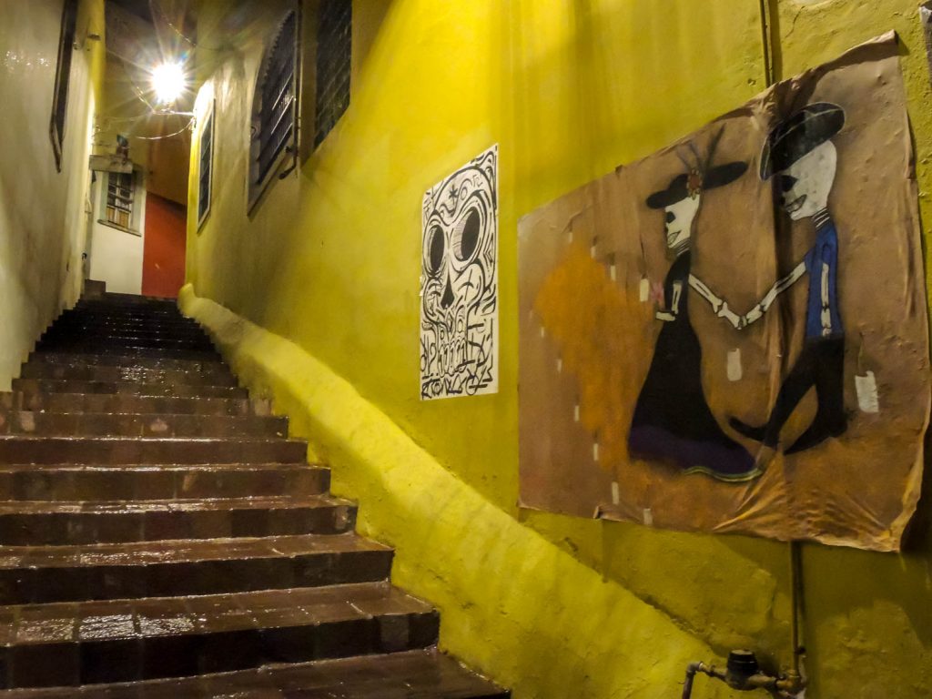 In Guanajuato, many streets are stairways. The death figures on the wall are a common Mexican icon. (Richard McGuire photo)