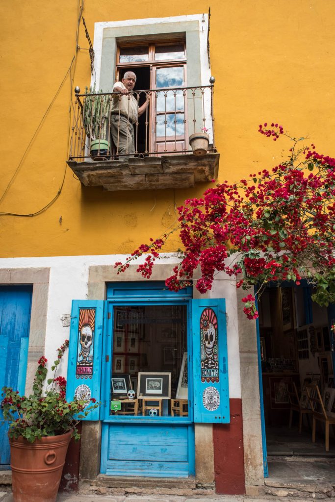 A shop is decorated with skull images in a small plaza off the main street in old Guanajuato, Mexico. (Richard McGuire Photo)