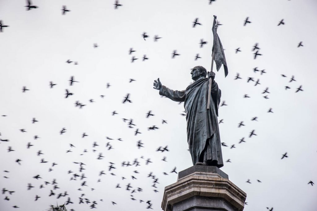 A statue of Father Miguel Hidalgo stands in the plaza in front of the church where he lauched the struggle for Mexican independence in 1810. The square was full of birds in the trees. (Richard McGuire photo)