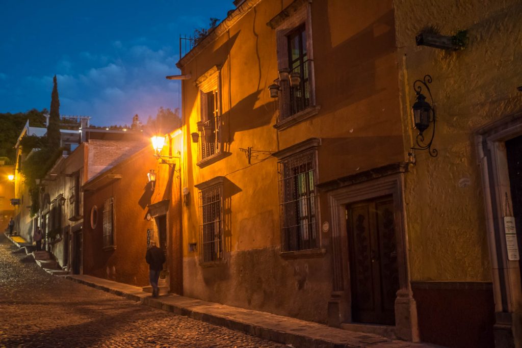 A man walks up a cobbled street in the historic centre of San Miguel de Allende. (Richard McGuire photo)