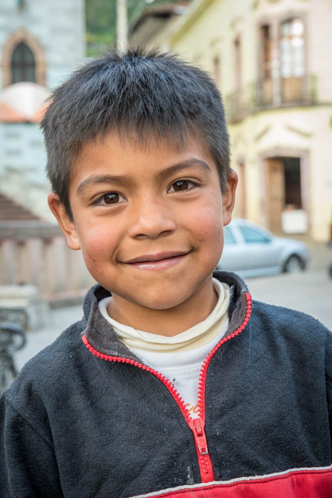 This little boy, age 6, befriended me in Angangueo's main square. He was curious about my camera, so I showed him how it worked by taking a portrait of him. (Richard McGuire Photo)
