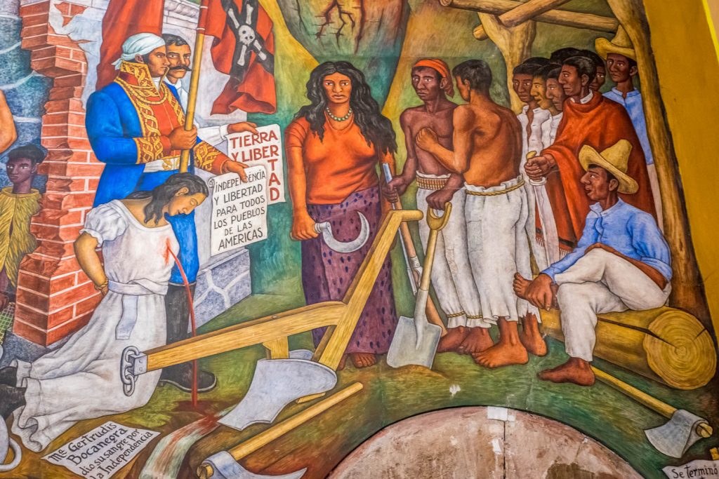 A detail from a mural by Juan O'Gorman, completed in 1942, shows the struggle for independence from Spain. At left is Gertrudis Bocanegra, who was executed by firing squad for supporting independencer, while behind her is independennce leader Jose Maria Morelos. (Richard McGuire Photo)
