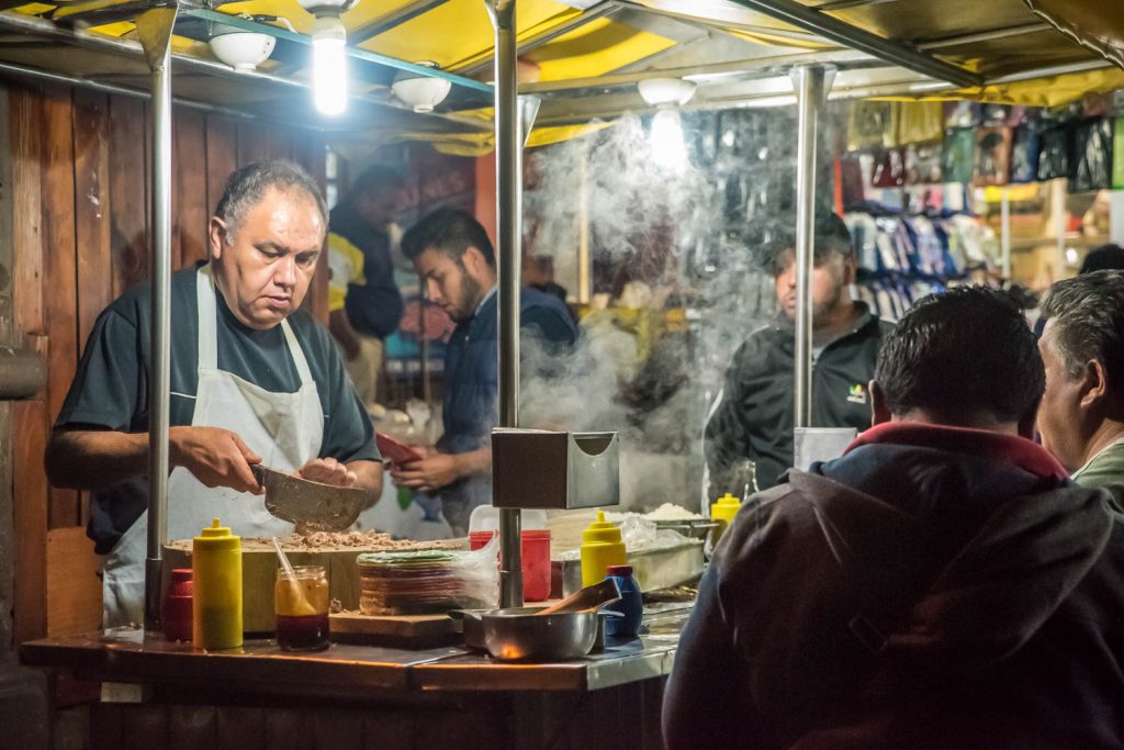 Many people come to the market in Patzcuaro in the evening for inexpensive meals from food stands. (Richard McGuire Photo)