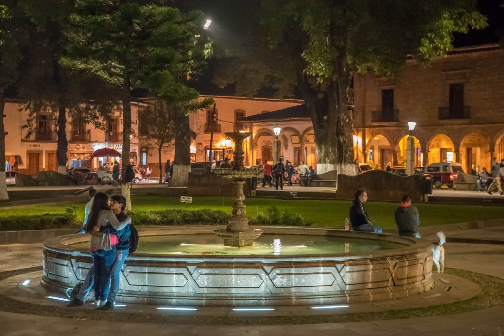 People hang out in the Plaza Grande of Patzcuaro in the evening. (Richard McGuire photo)